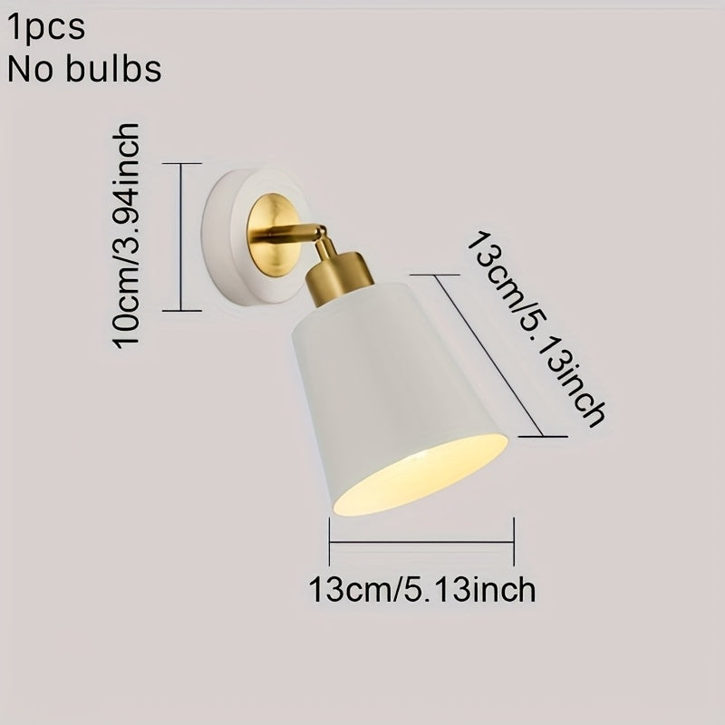 Vägglampa i metall med justerbar arm