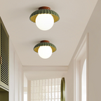 Plafond i järn med glasklot