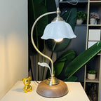 Bordslampa med svanhals och blomformad skärm
