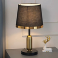 Bordslampa i svart och guld