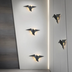 Vägglampa i origamiform