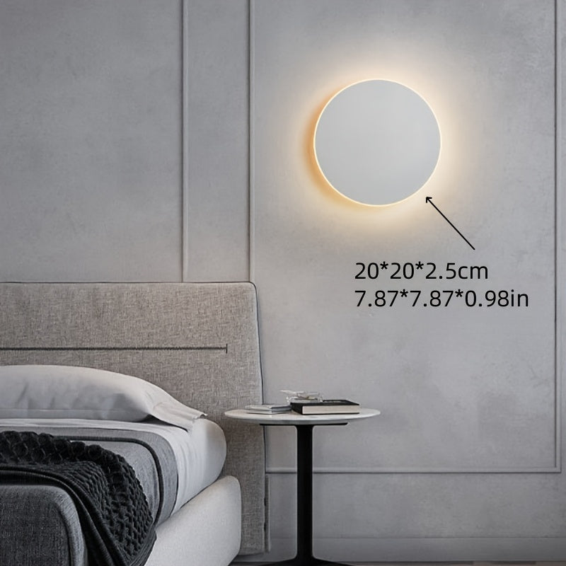 Rund vägglampa i järn med LED
