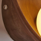 Rund vägglampa i resin