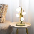 Bordslampa med blomformade skärmar