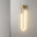 Vägglampa i loopform | LED-väggarmatur i guld eller svart