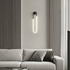 Vägglampa i loopform med LED
