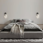 Vägglampa i loopform med LED
