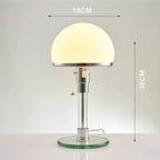 Bordslampa med frostad glaskupol