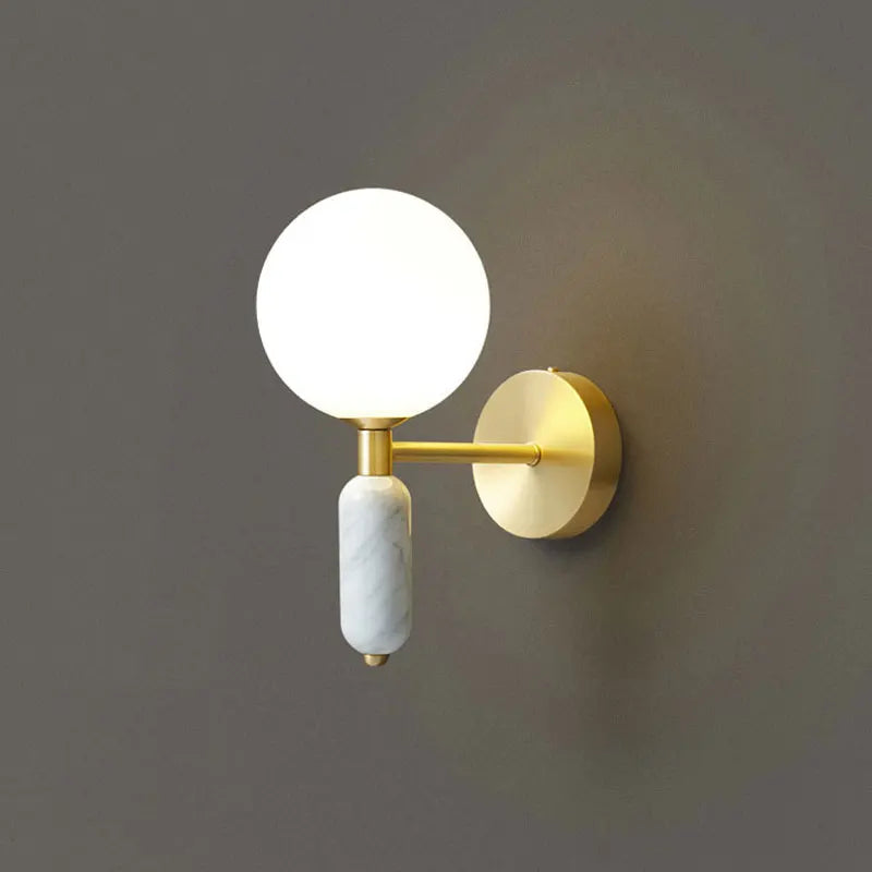 Vägglampa i marmor och glas