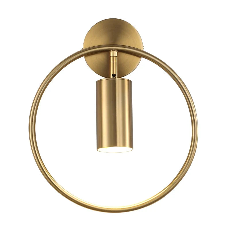 Vägglampa med roterbar ring