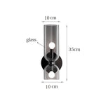 Vägglampa i rökfärgat glas