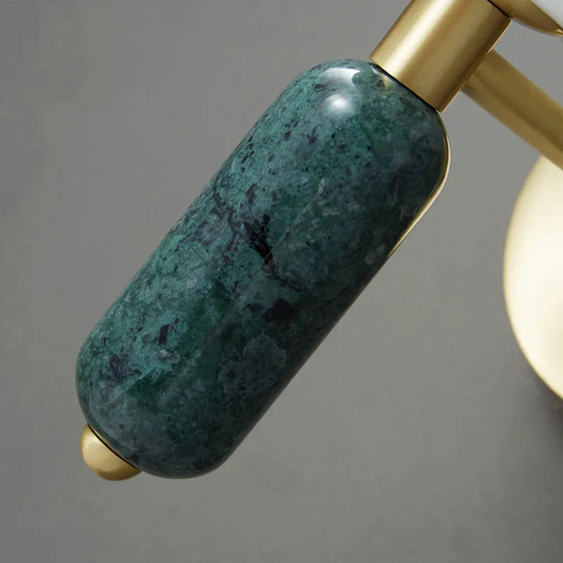 Vägglampa i marmor och glas