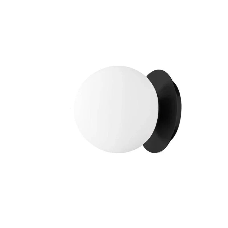 Nordisk vägglampa med glasklot