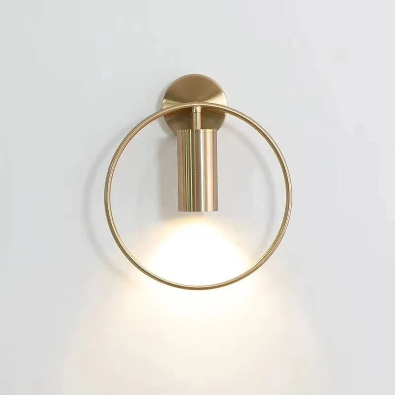 Vägglampa med roterbar ring