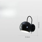 Vägglampa med vridbar kupa