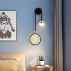Vägglampa med rund akrylskiva