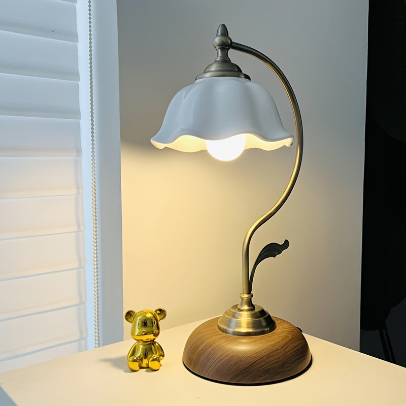 Bordslampa med svanhals och blomformad skärm