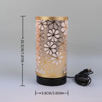 Bordslampa med blomstermönstrad skärm