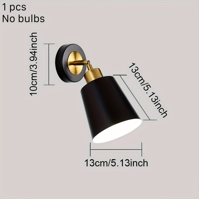 Vägglampa i metall med justerbar arm