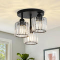 Taklampa med tre kristallkupor