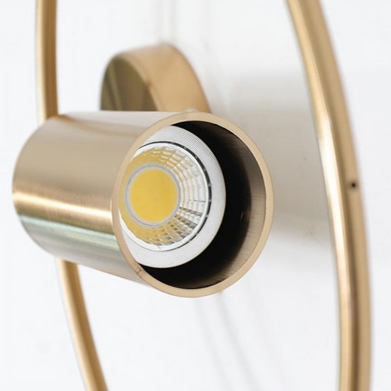 Vägglampa med roterbar ring